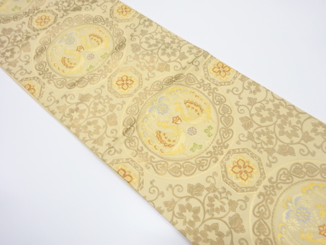 とみや織物製　向かい孔雀に花唐草模様織り出し袋帯